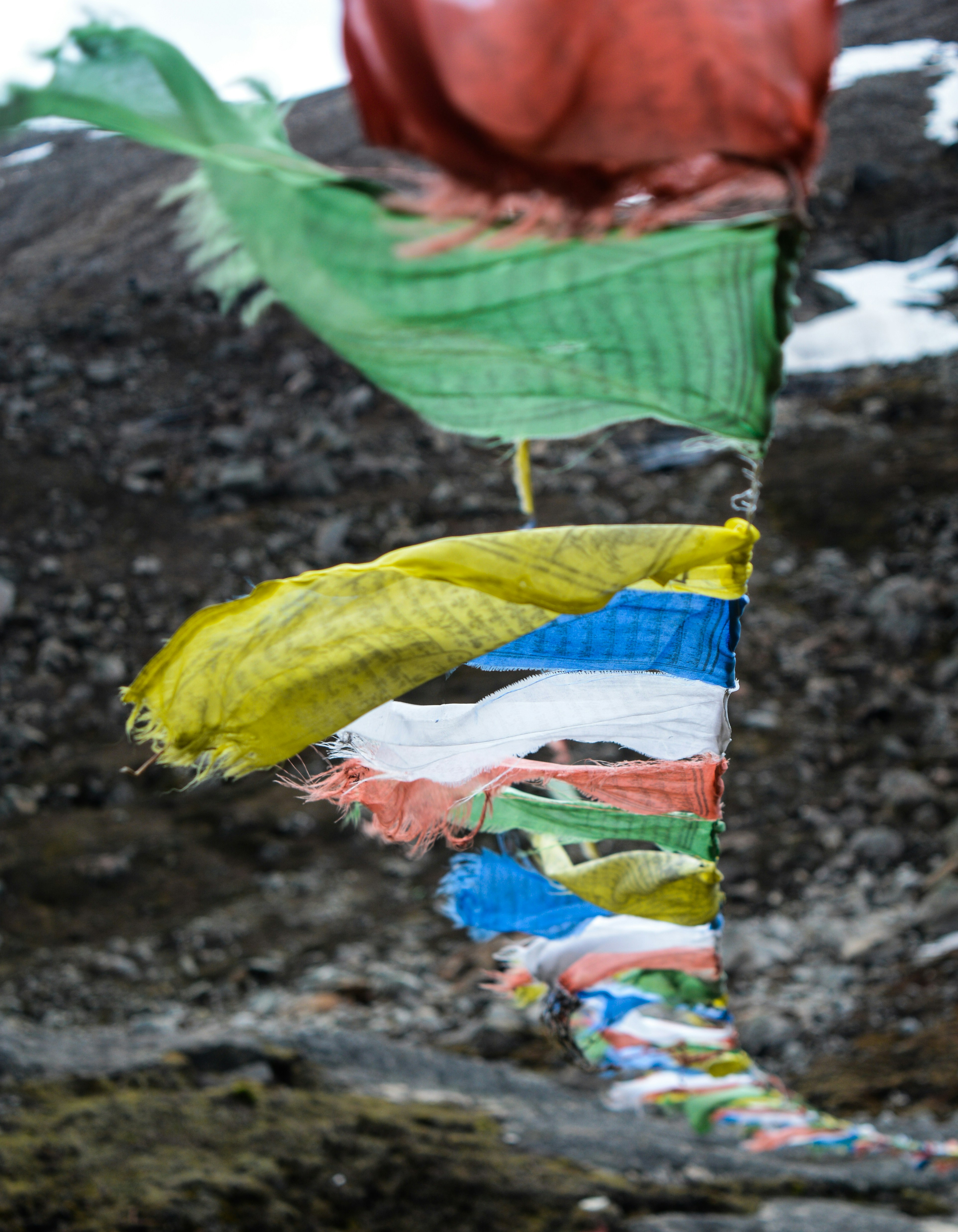 assorted coloured buntings blowing in the wind